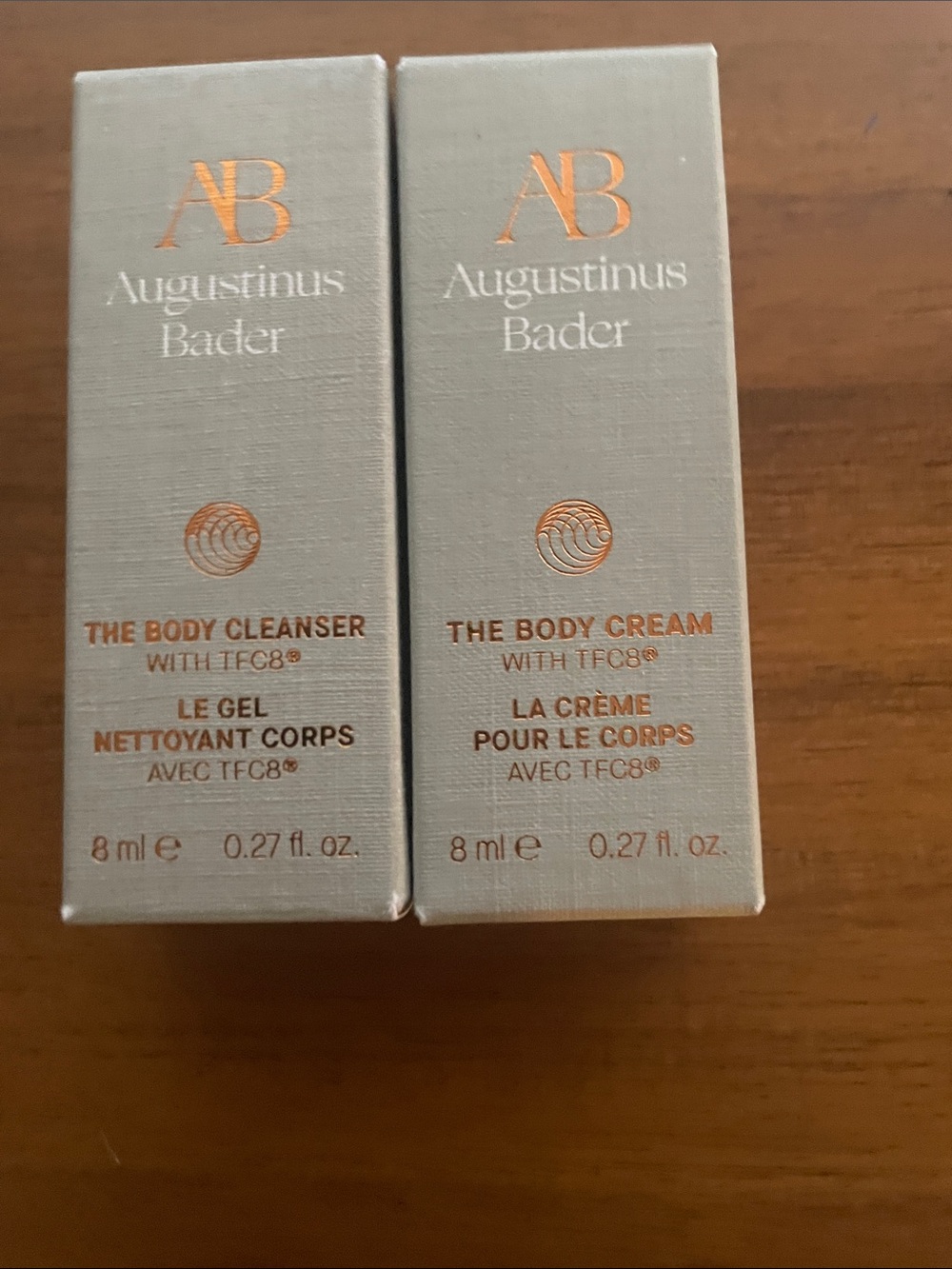 Agustinus Bader The Body Cream & The Body Cleanser (Set) with blue toiletry bag